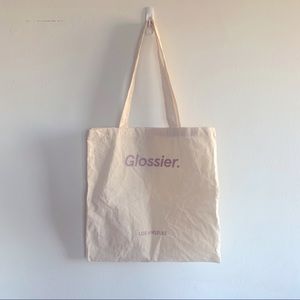 Glossier tote bag from Melrose location pre covid baby
